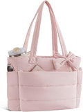Cruelty-Free: A high-quality vegan leather satchel bag with pockets from Calvin Klein; luxury designer bags for women with all the fashionable details and none of the guilt.