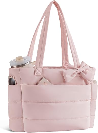 Cruelty-Free: A high-quality vegan leather satchel bag with pockets from Calvin Klein; luxury designer bags for women with all the fashionable details and none of the guilt.